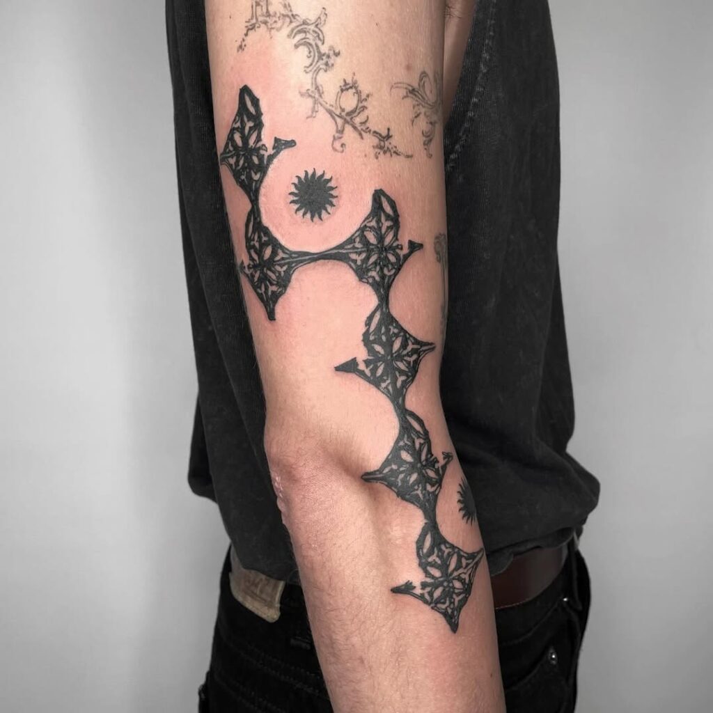 Gothic Ornament Arm Tattoo