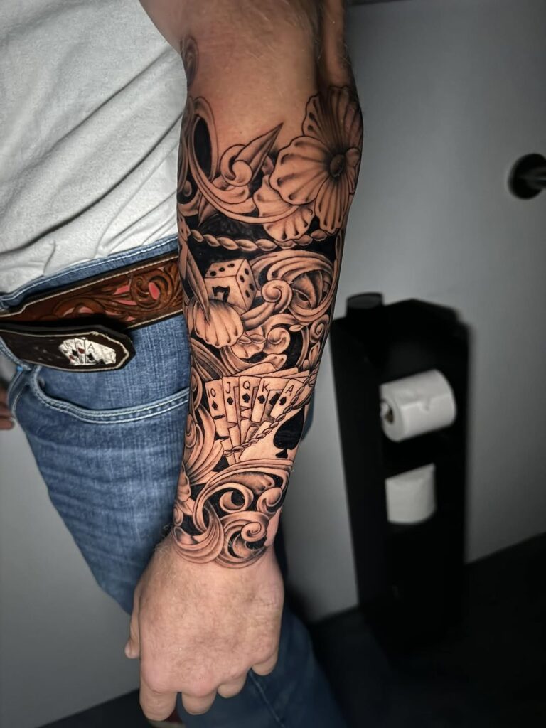 Black And Grey Leather Work Tattoo
