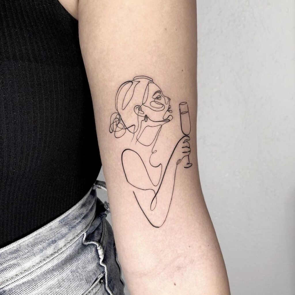 Elegant Single-Line Tattoo