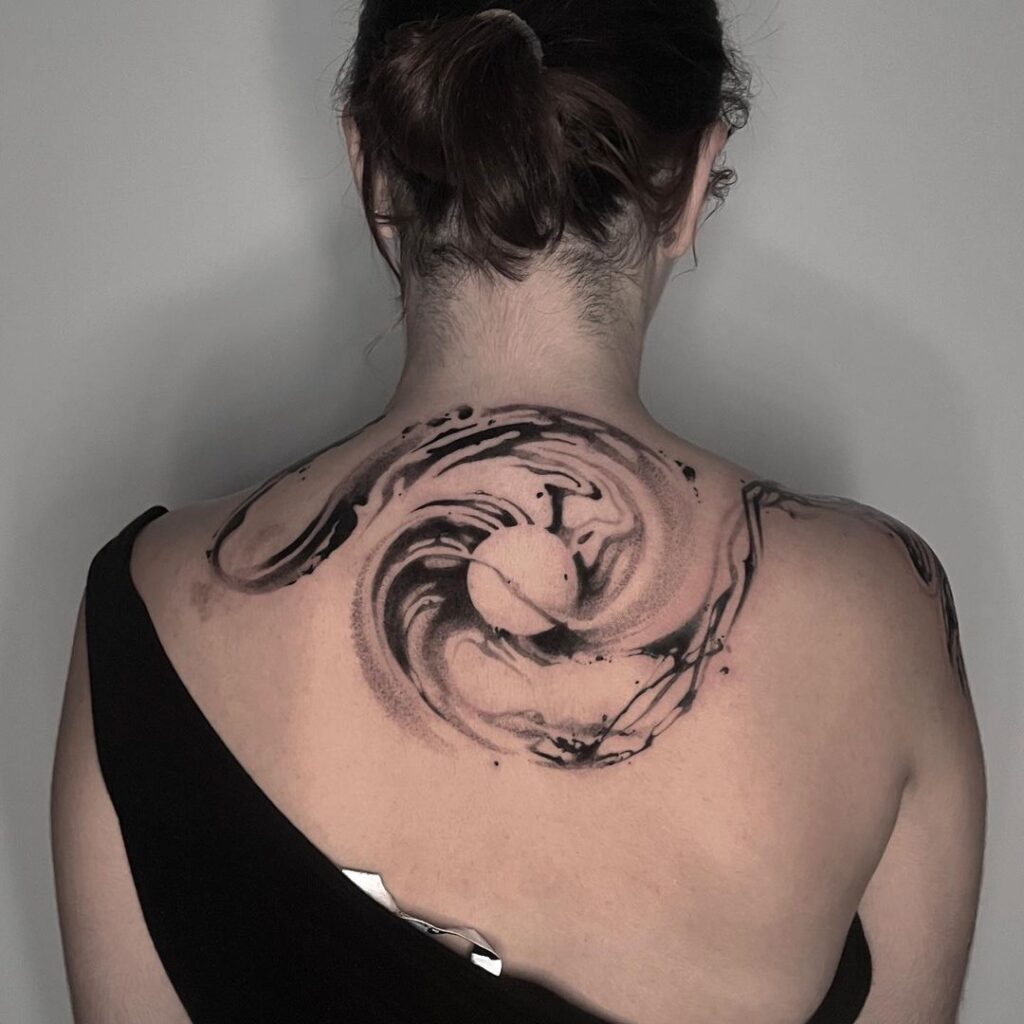 Flowing Back Tattoo