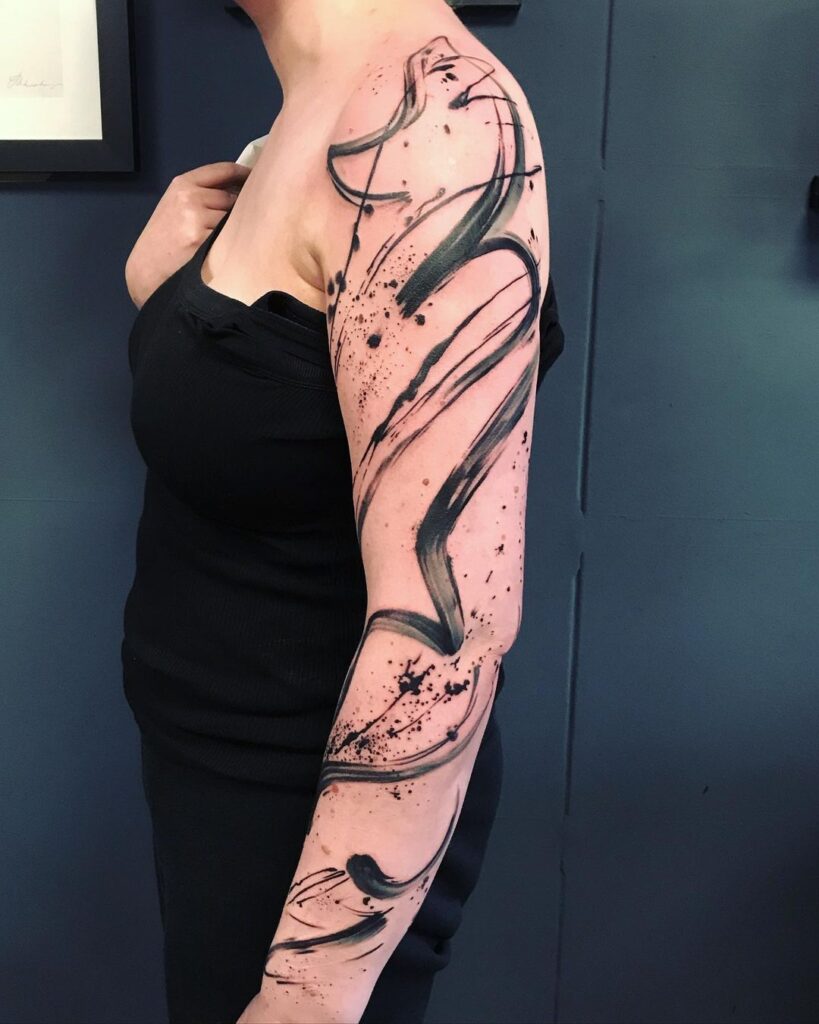 Brushstroke Arm Tattoo