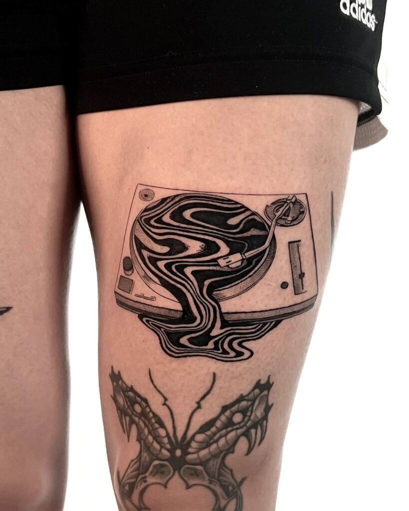Melted Record Player Suminagashi Tattoo