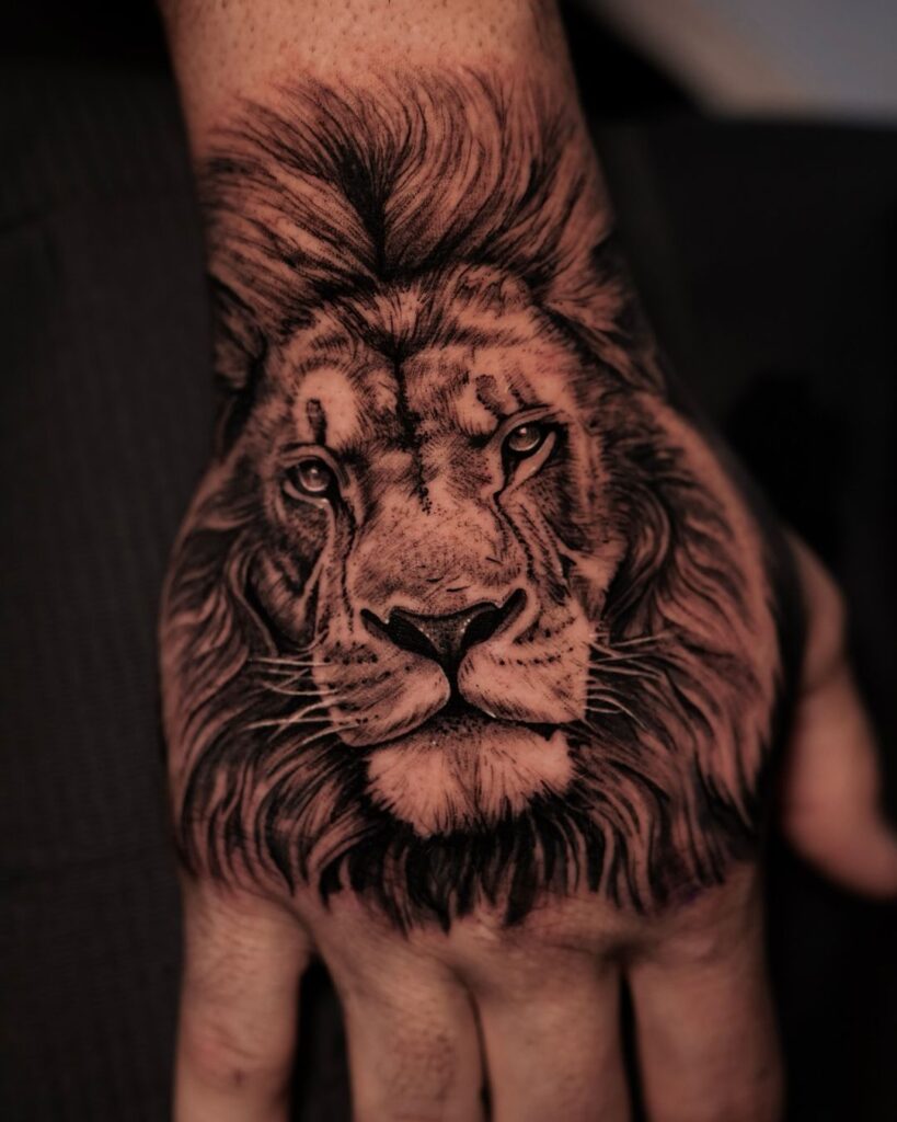 Lion Hand Tattoo