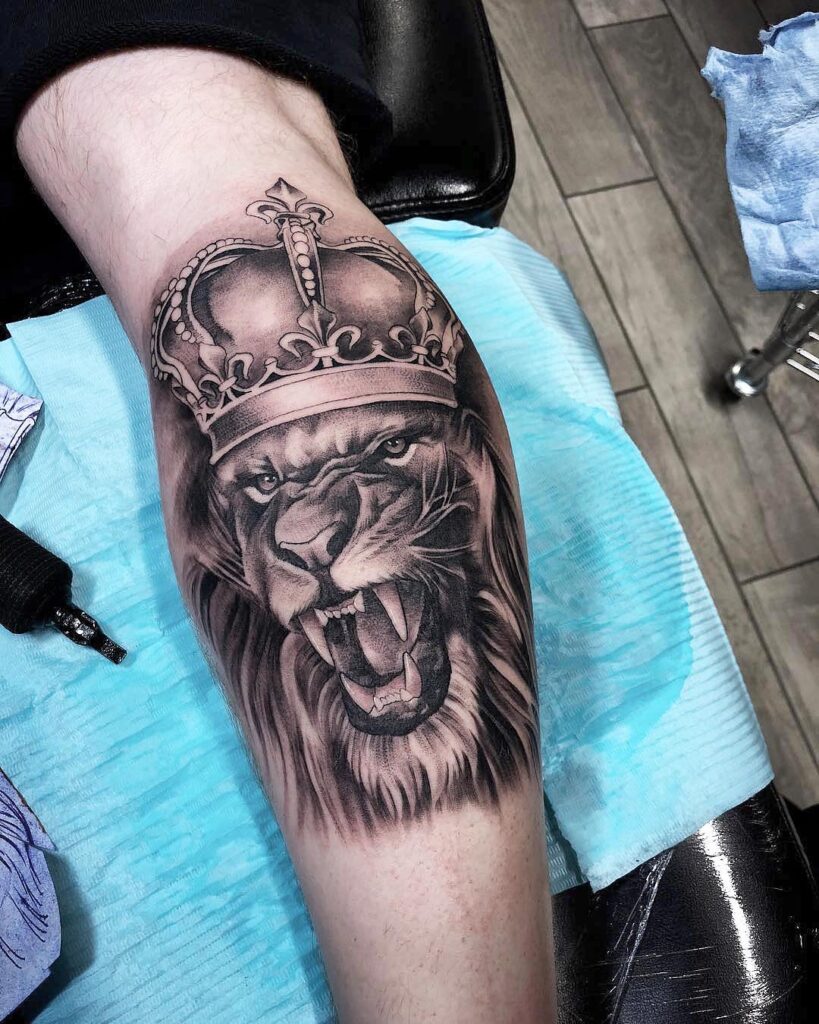 Lion With Crown Calf Tattoo