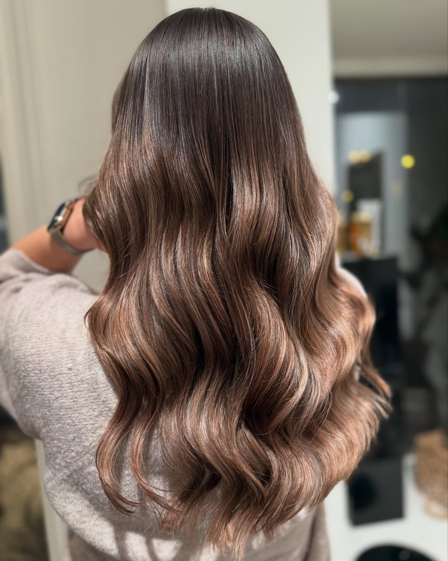 3. Glossy Mocha Waves (Blonde Brown Hair Color)