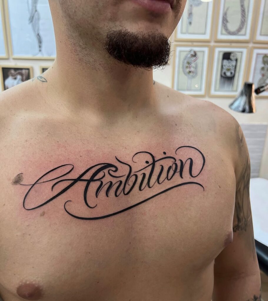 Ambition Chest Script Tattoo