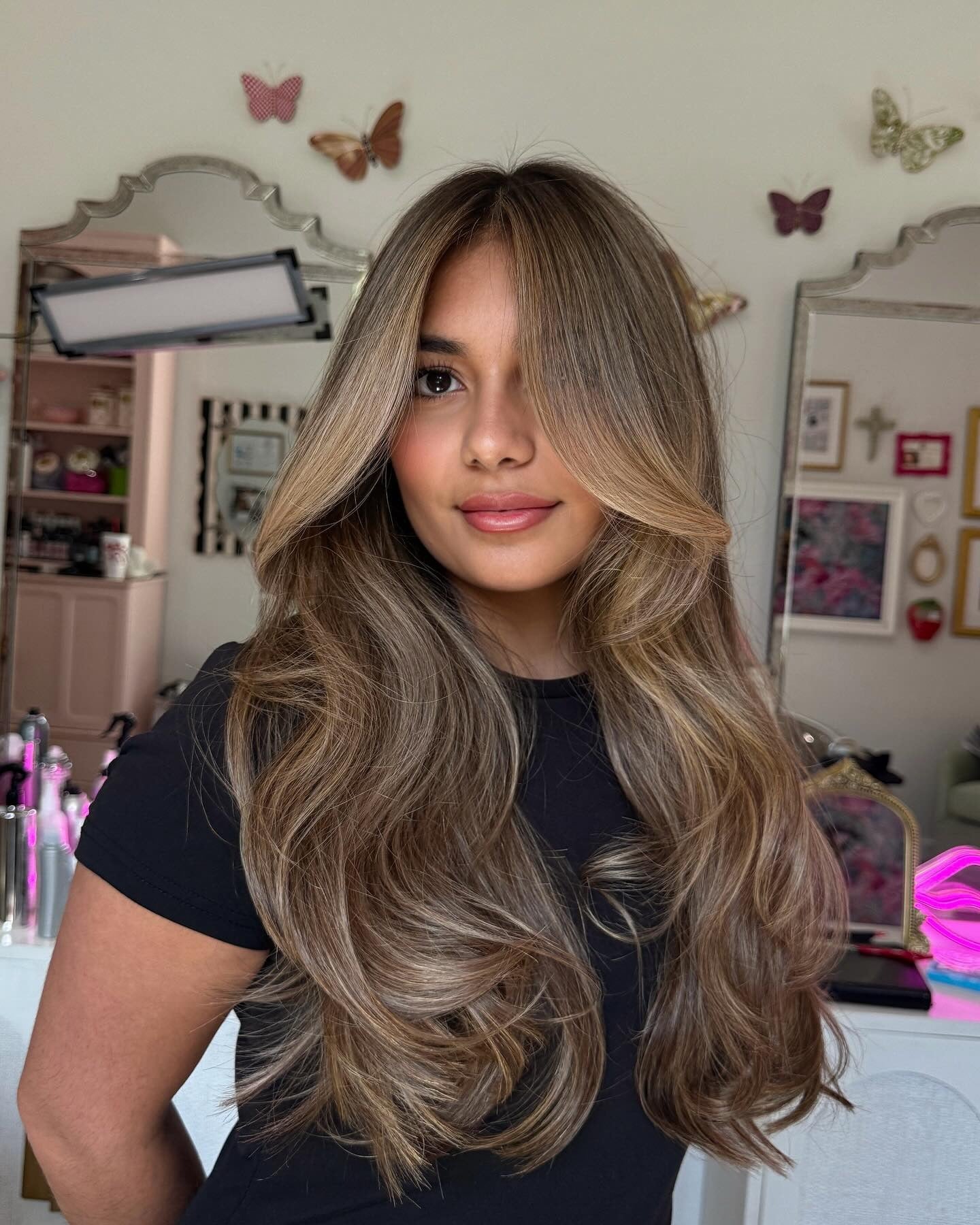 6. Golden Mocha Blowout with Seamless Layers (Dark Blonde Hair Color with Highlights)