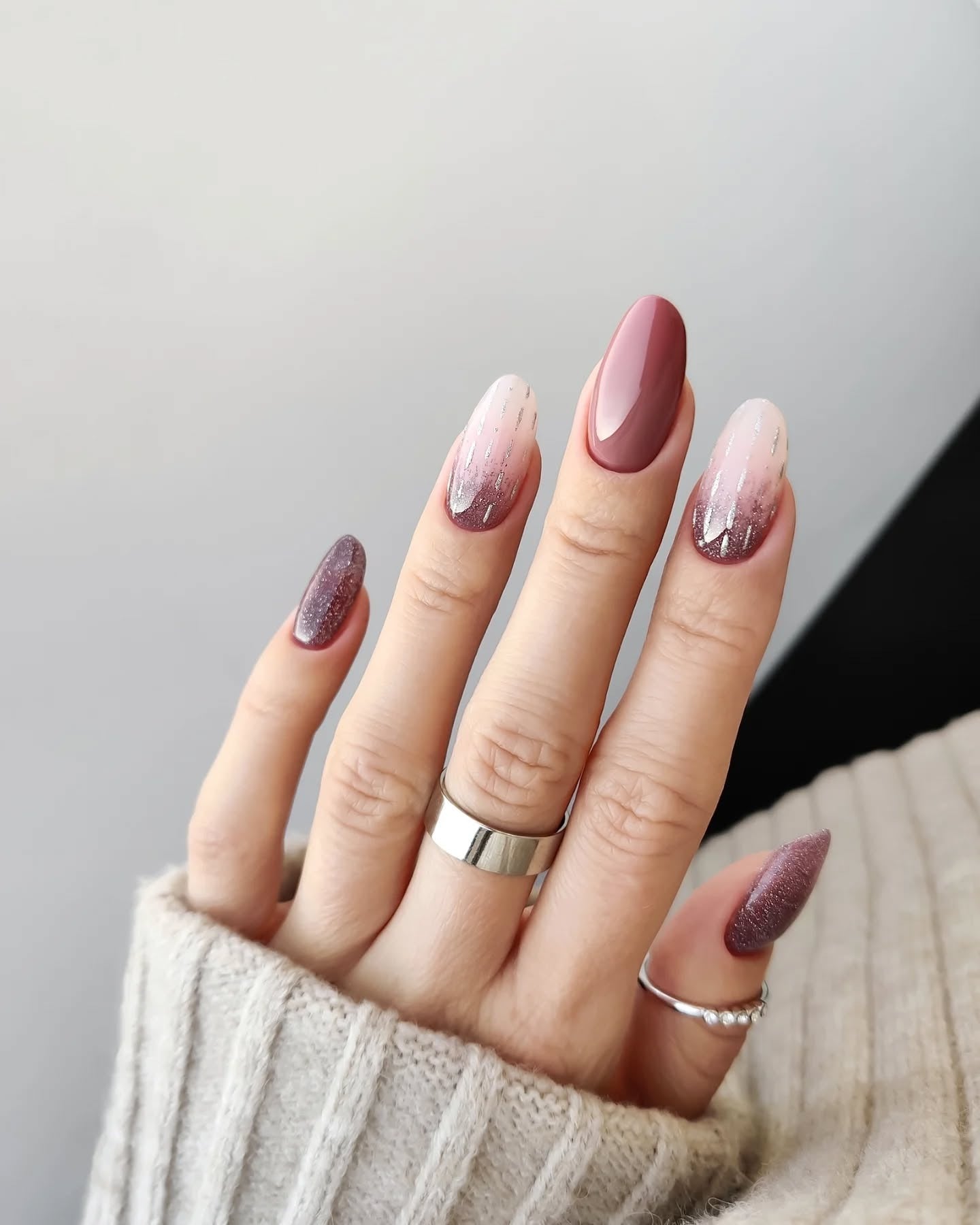 12. Dusty Mauve Gradient with Subtle Sparkle (Winter Almond Nail Ideas)