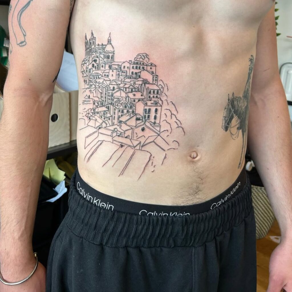 Cityscape Stomach Tattoo