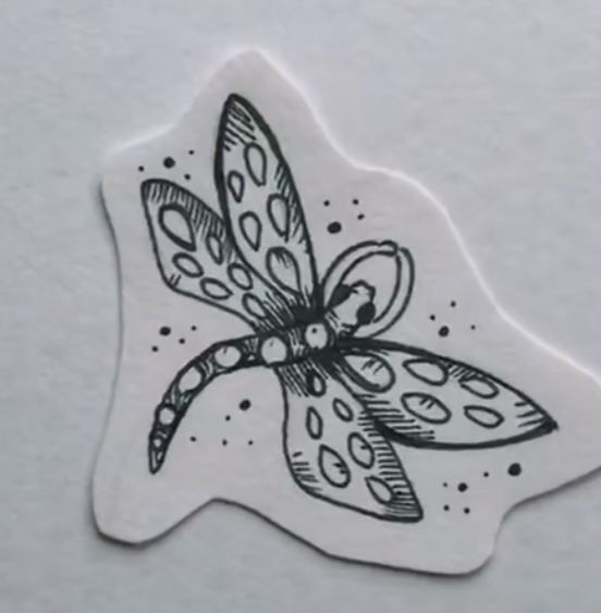 coraline dragonfly tattoo