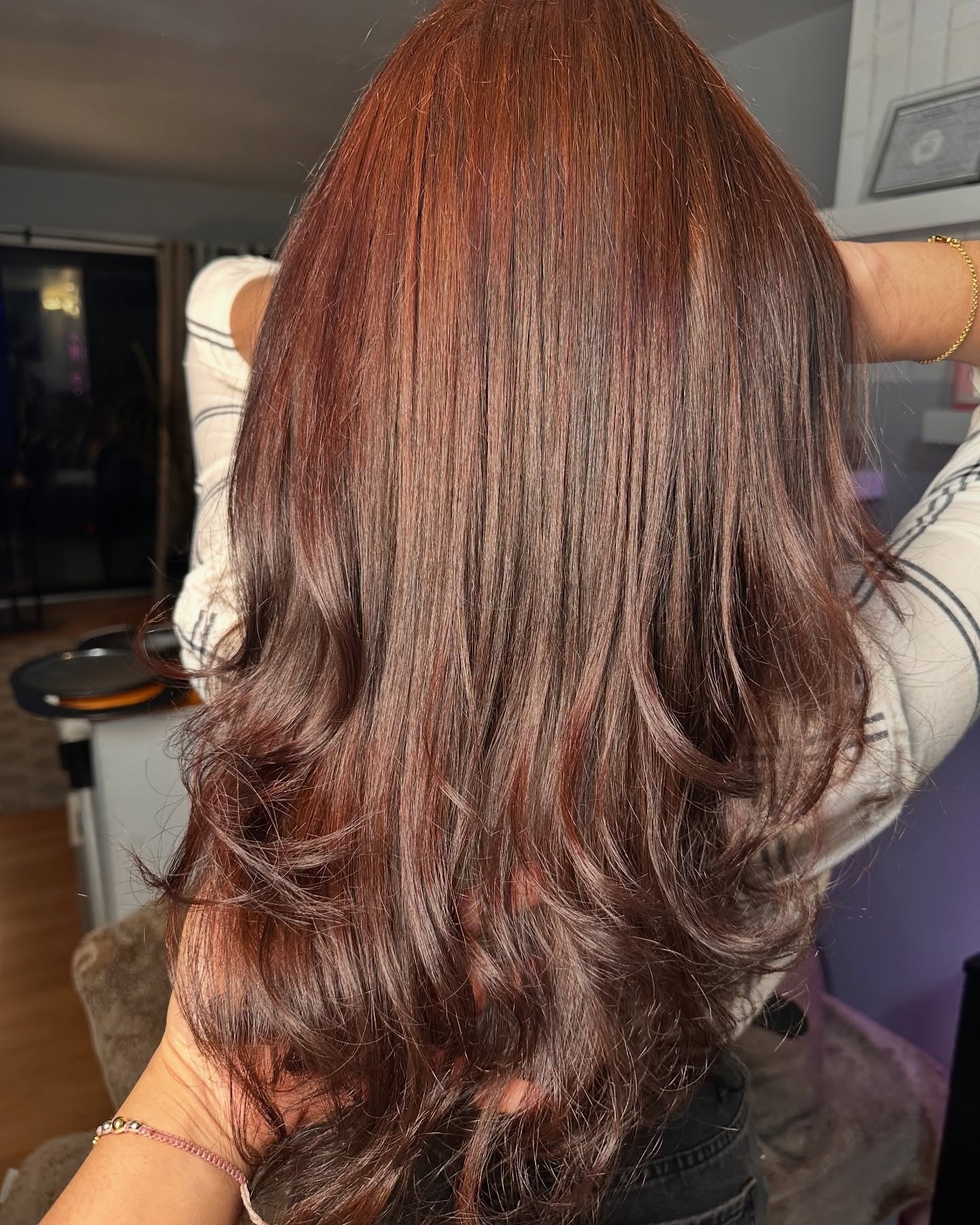 3. Layered Auburn with Subtle Red Accents (Dark Auburn Hair Color)