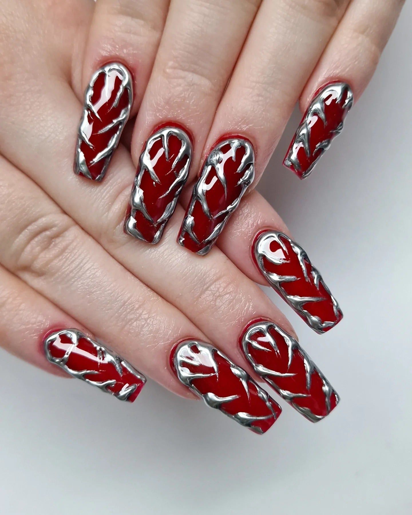5. Red Coffin Nails with Metallic Silver Texture (Dark Red Coffin Nail Ideas)