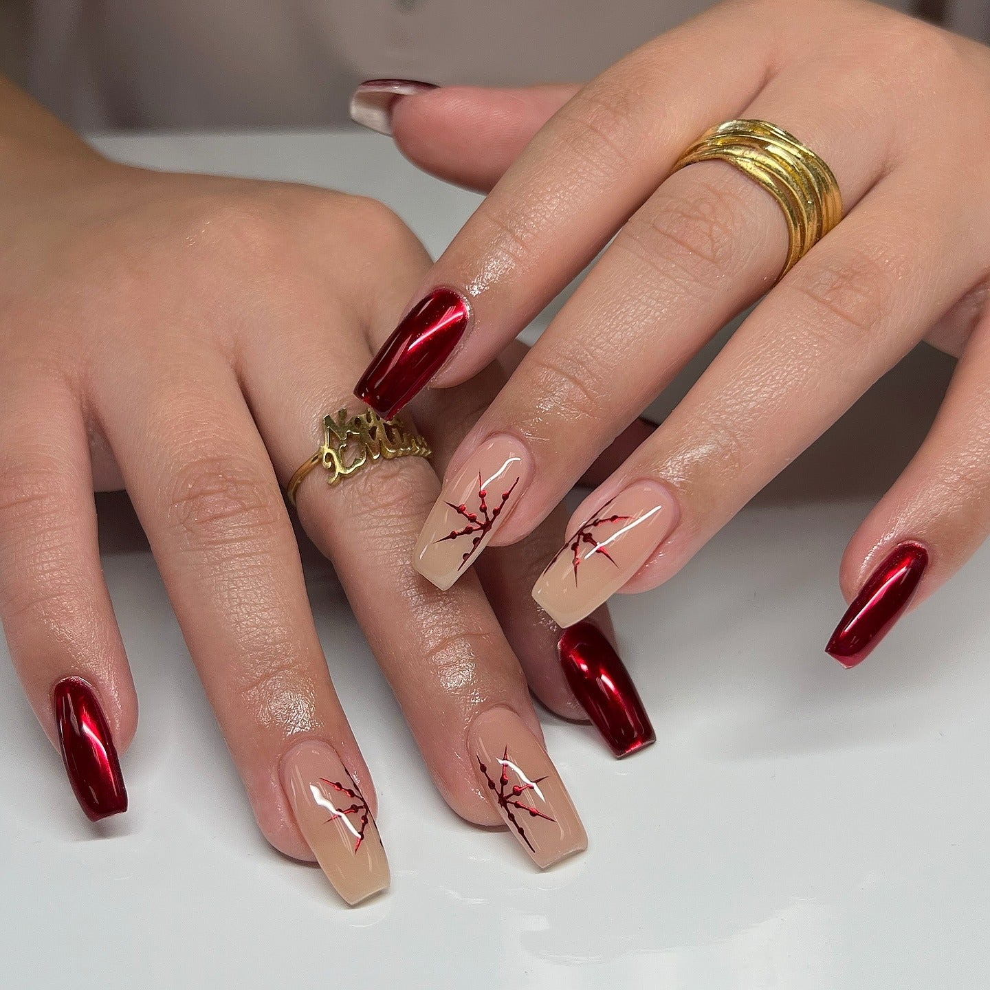 9. Chrome Red Coffin Nails with Branch Detail (Dark Red Coffin Nail Ideas)