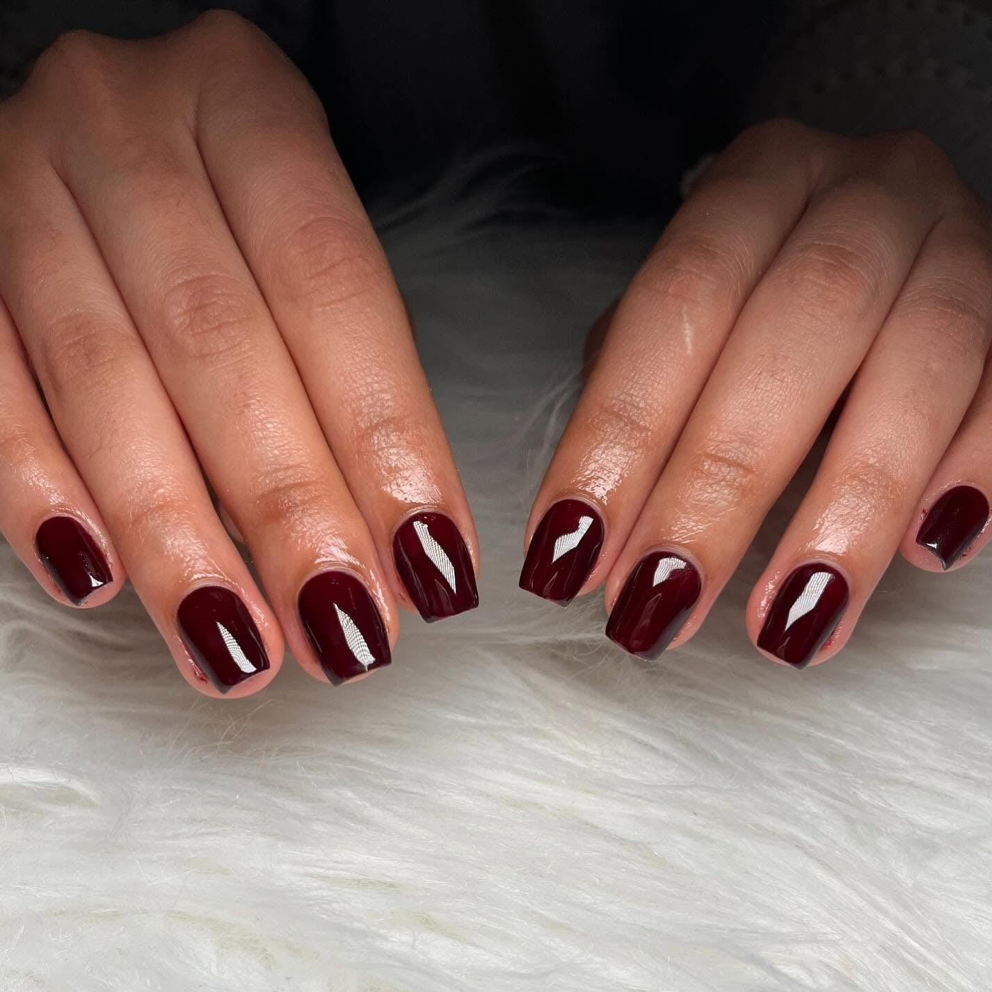 13. Short Glossy Burgundy Nails (Dark Red Coffin Nail Ideas)