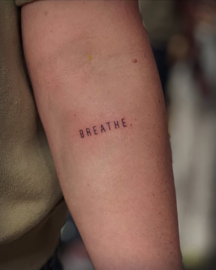 Small Word Breathe Tattoo