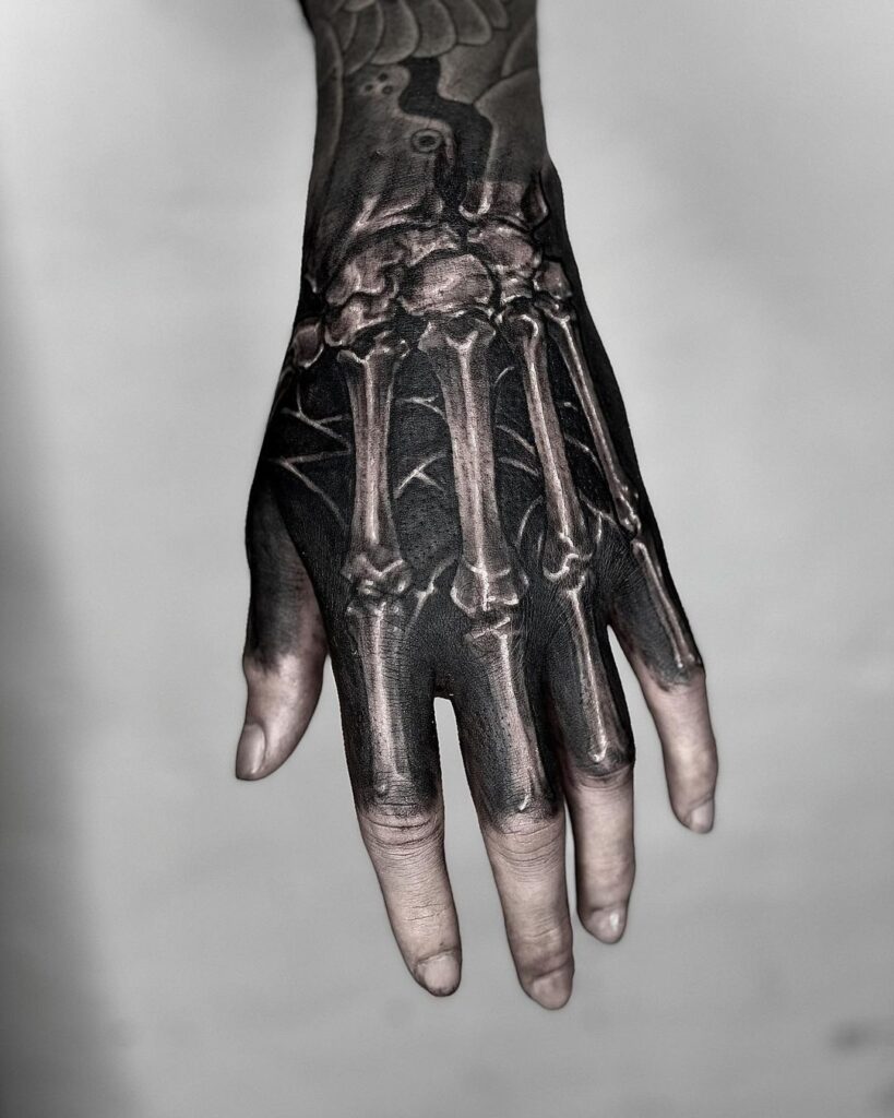 Blackwork Bone Hand Tattoo