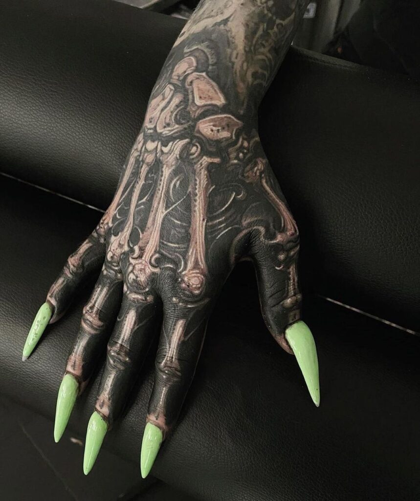 Witchy Bone Hand Tattoo
