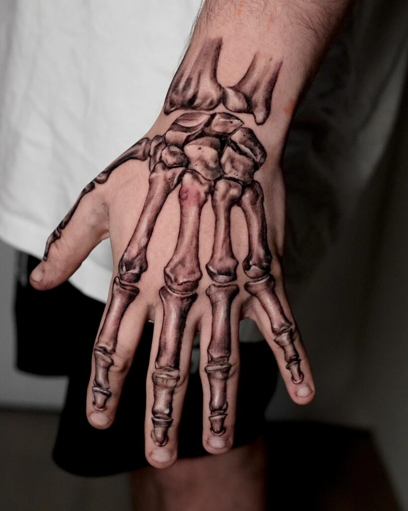 Realistic Bone Hand Tattoo