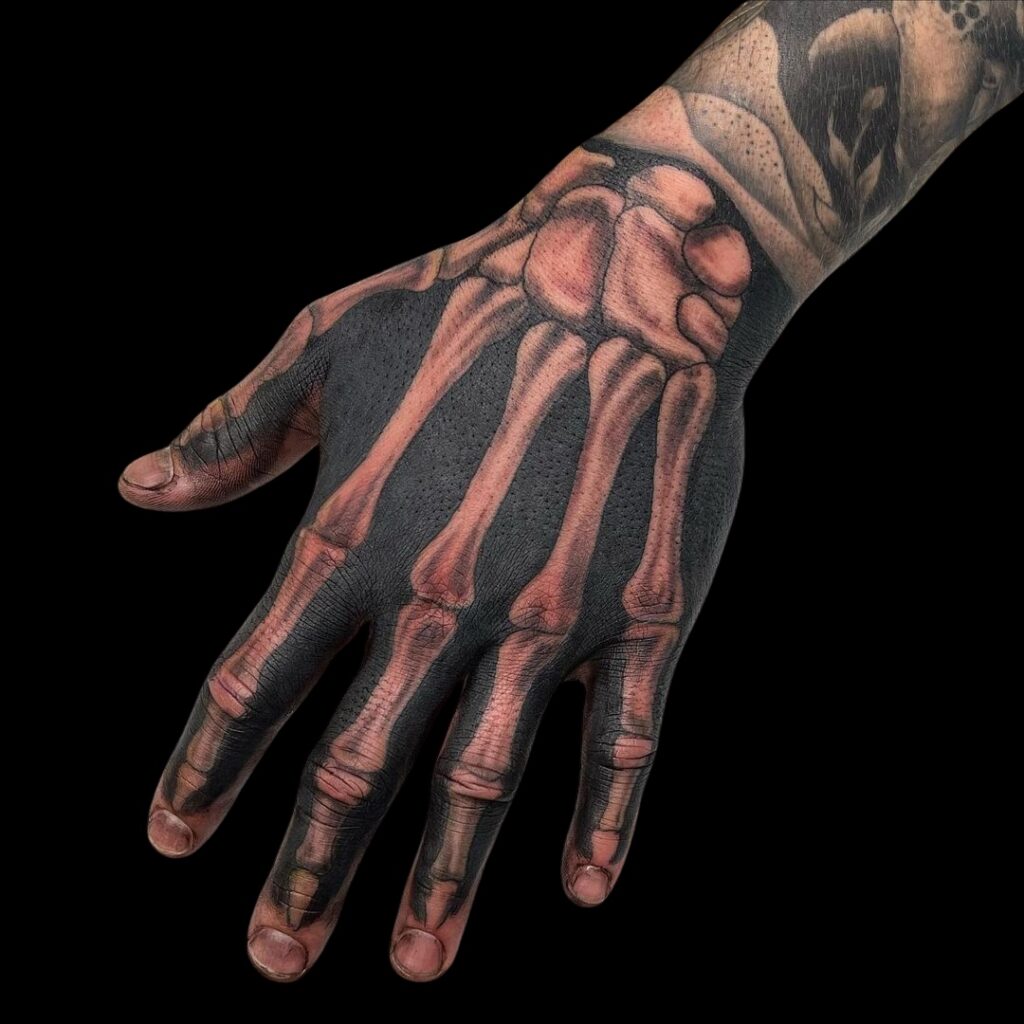 Creepy Bone Hand Tattoo