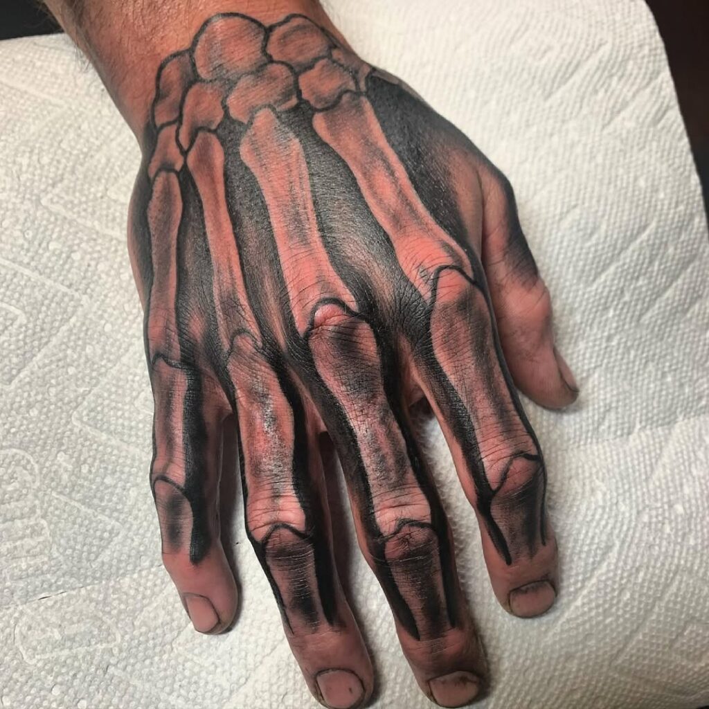 Terrifying Bone Hand Tattoo