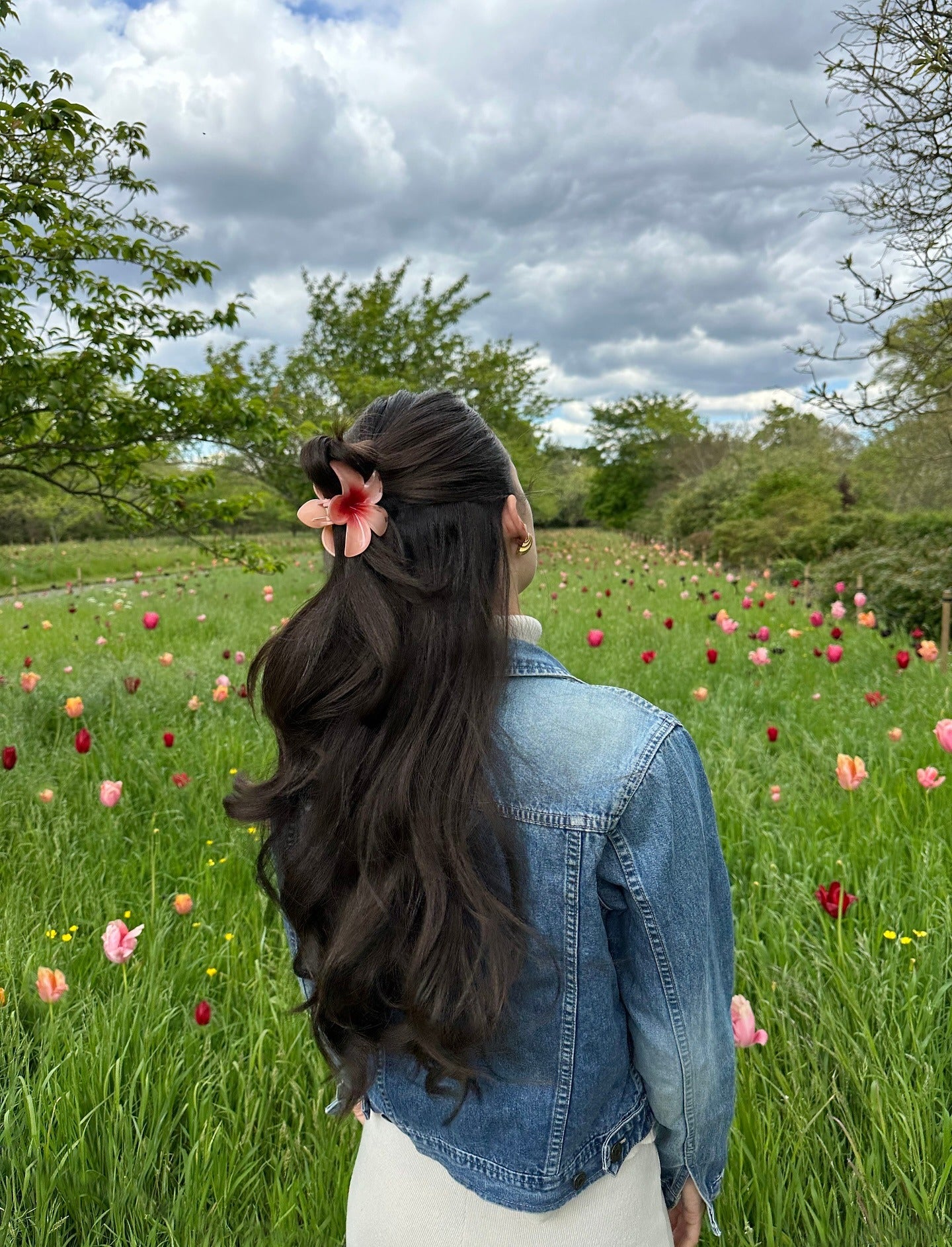 2. Half-Up Long Waves with Coral Flower Clip (Claw Clip Hairstyles)