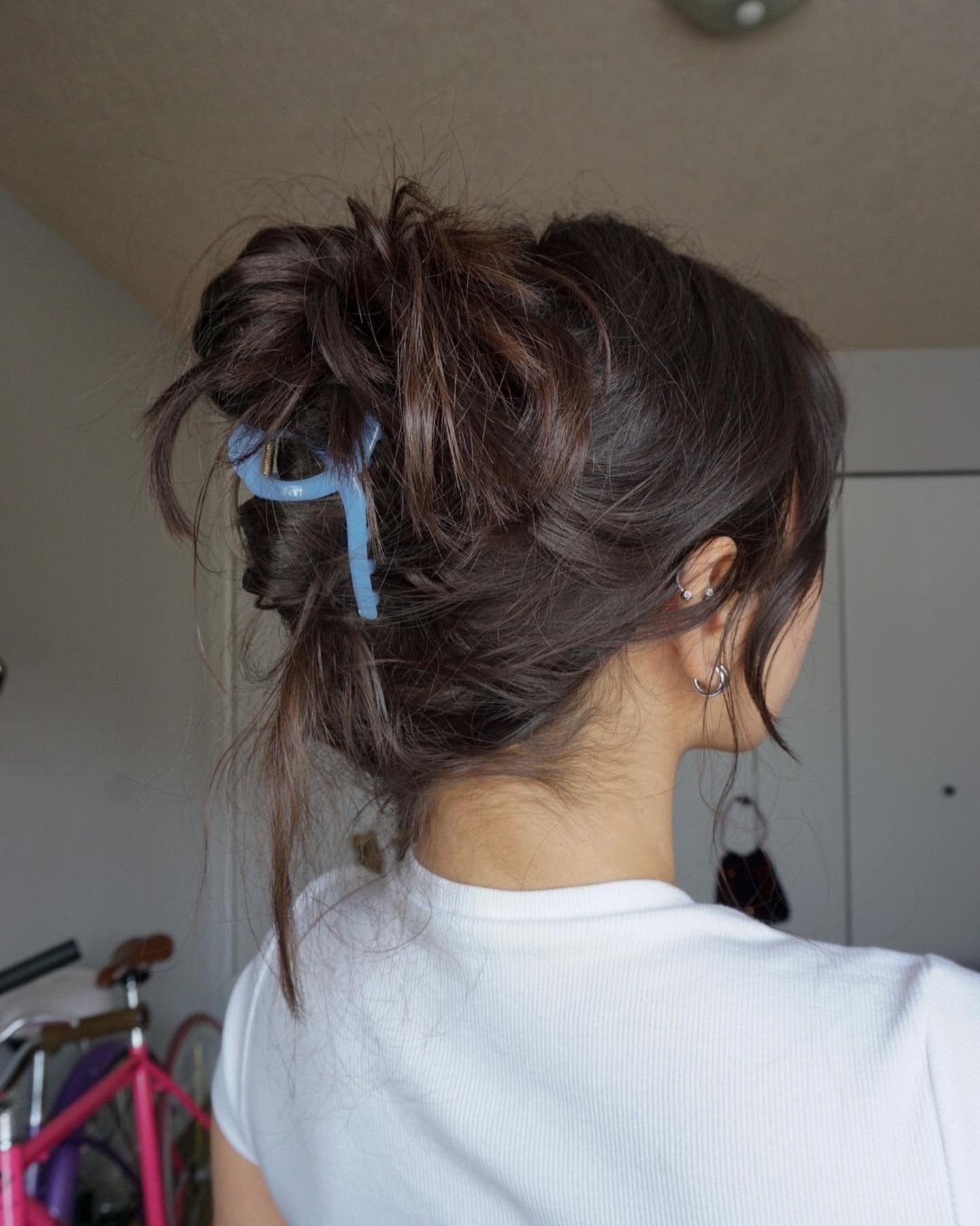 10. Relaxed Textured Bun with Blue Clip (Claw Clip Hairstyles)