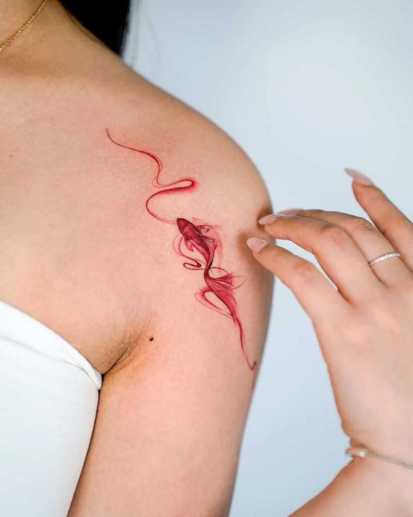 Feminine Koi Fish Shoulder Tattoo