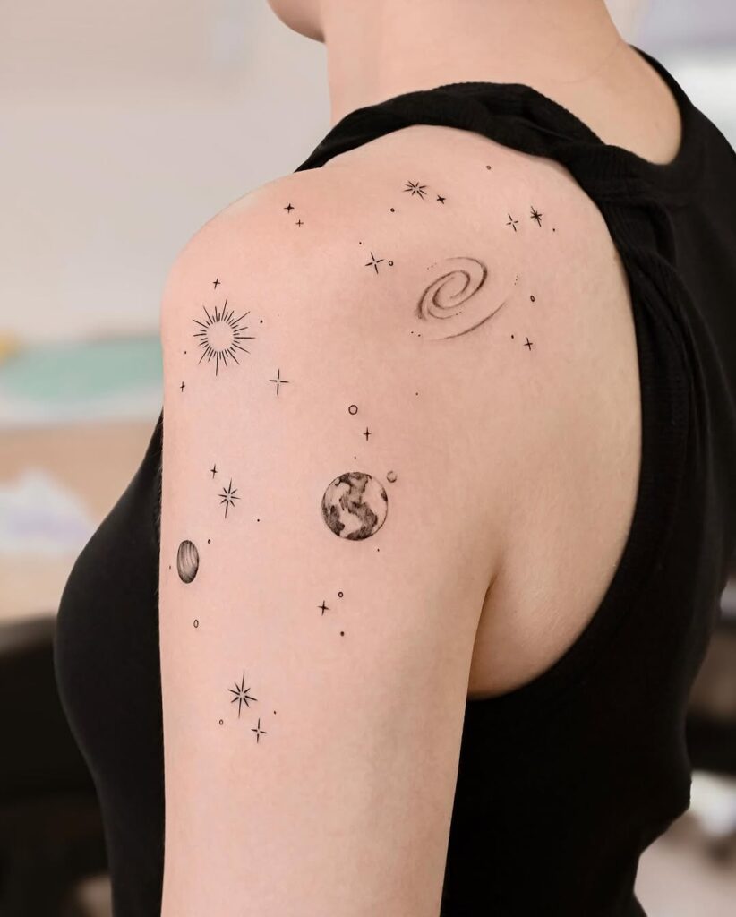 Feminine Universe Shoulder Tattoo