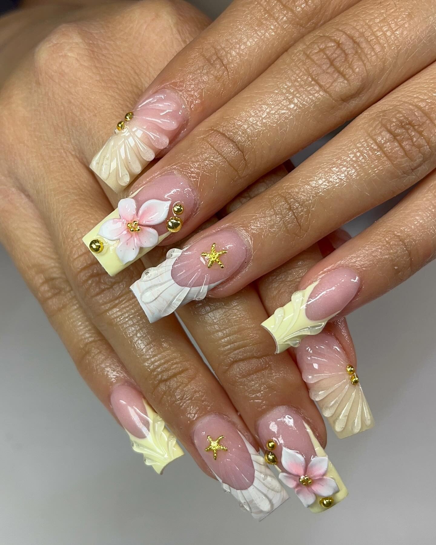 2. 3D Floral Fantasy in Pearly Cream (Yellow and White Nail Ideas)