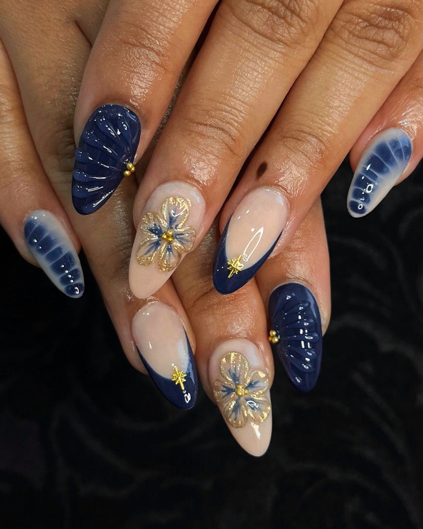 12. 3D Floral and Navy Shell Art (Navy and Gold Nail Ideas)