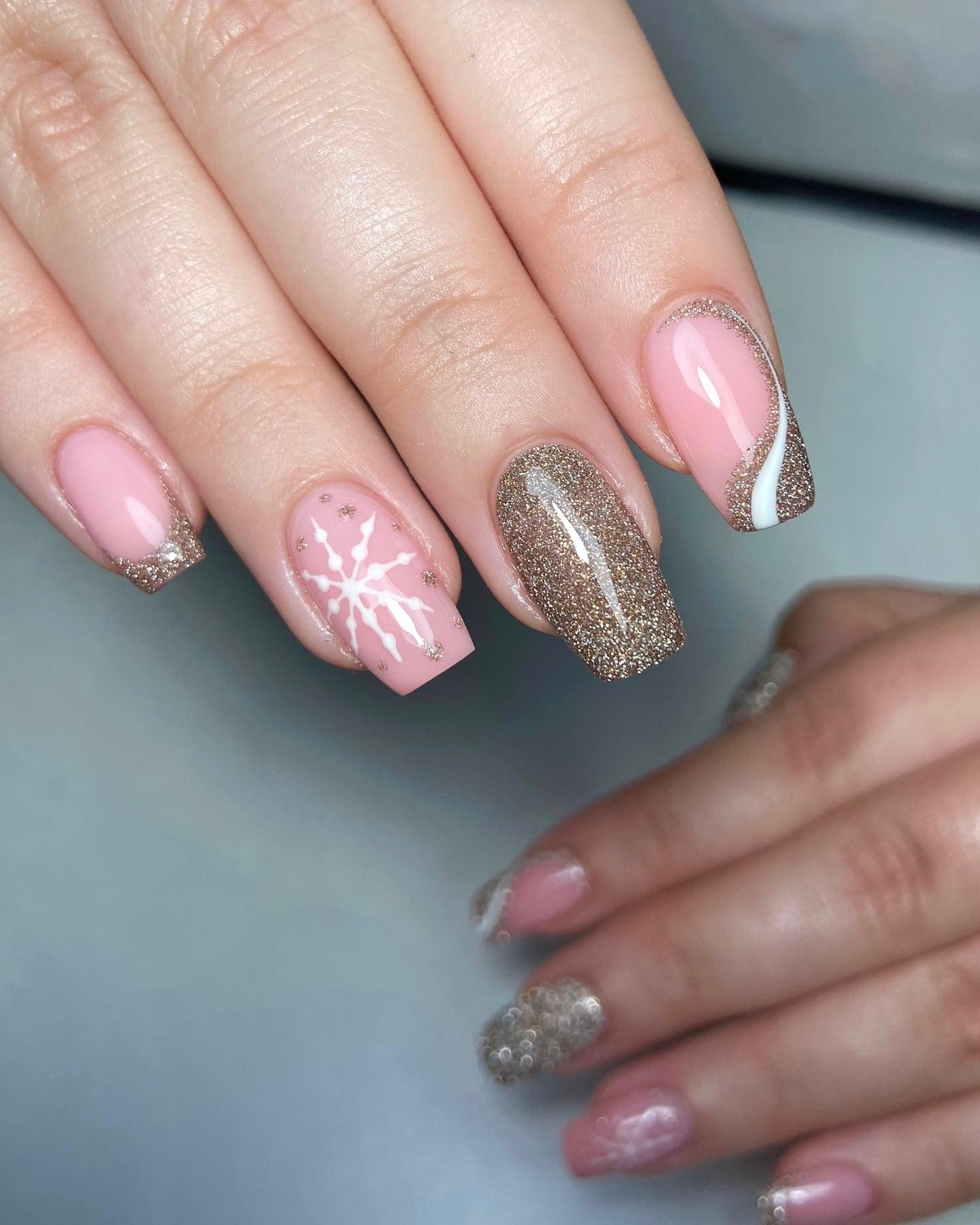 1. Blush Pink Glitter Elegance with Snowflake Charm (Winter Birthday Nail Ideas)