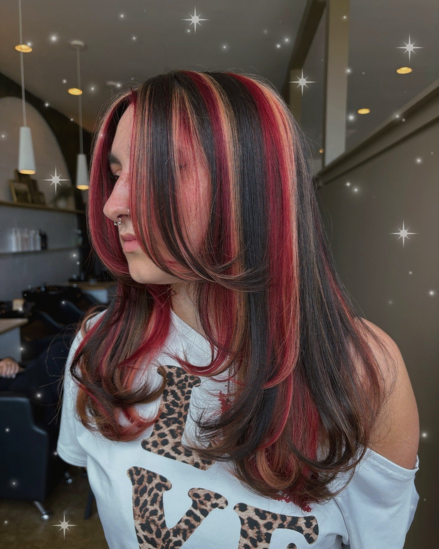 4. Striped Cherry Red, Black, and Blonde Layers (Red Hair with Highlights)