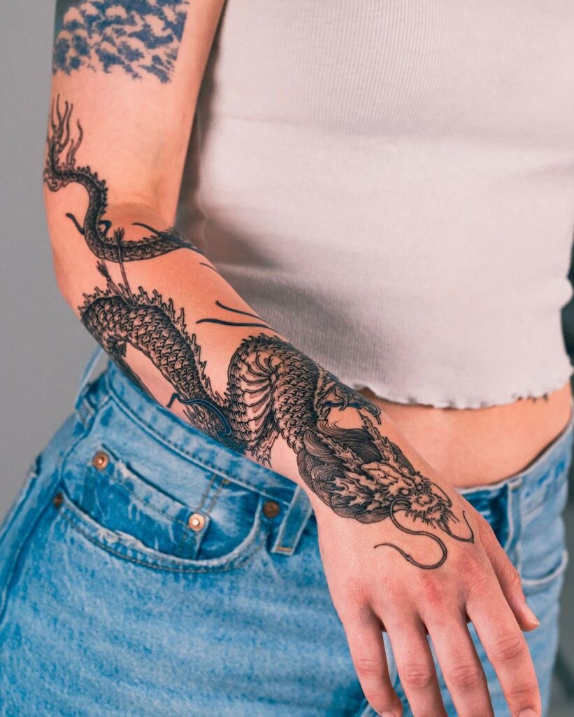 Black Dragon Arm Tattoo