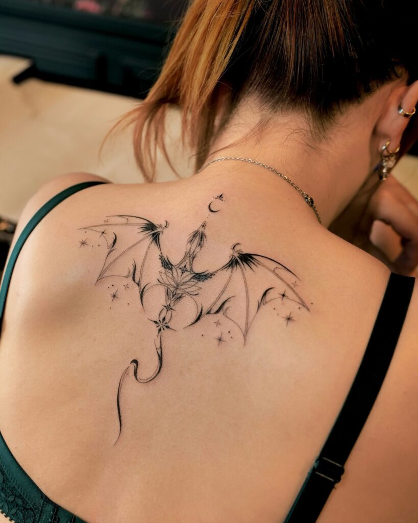 Minimalistic Dragon Back Tattoo