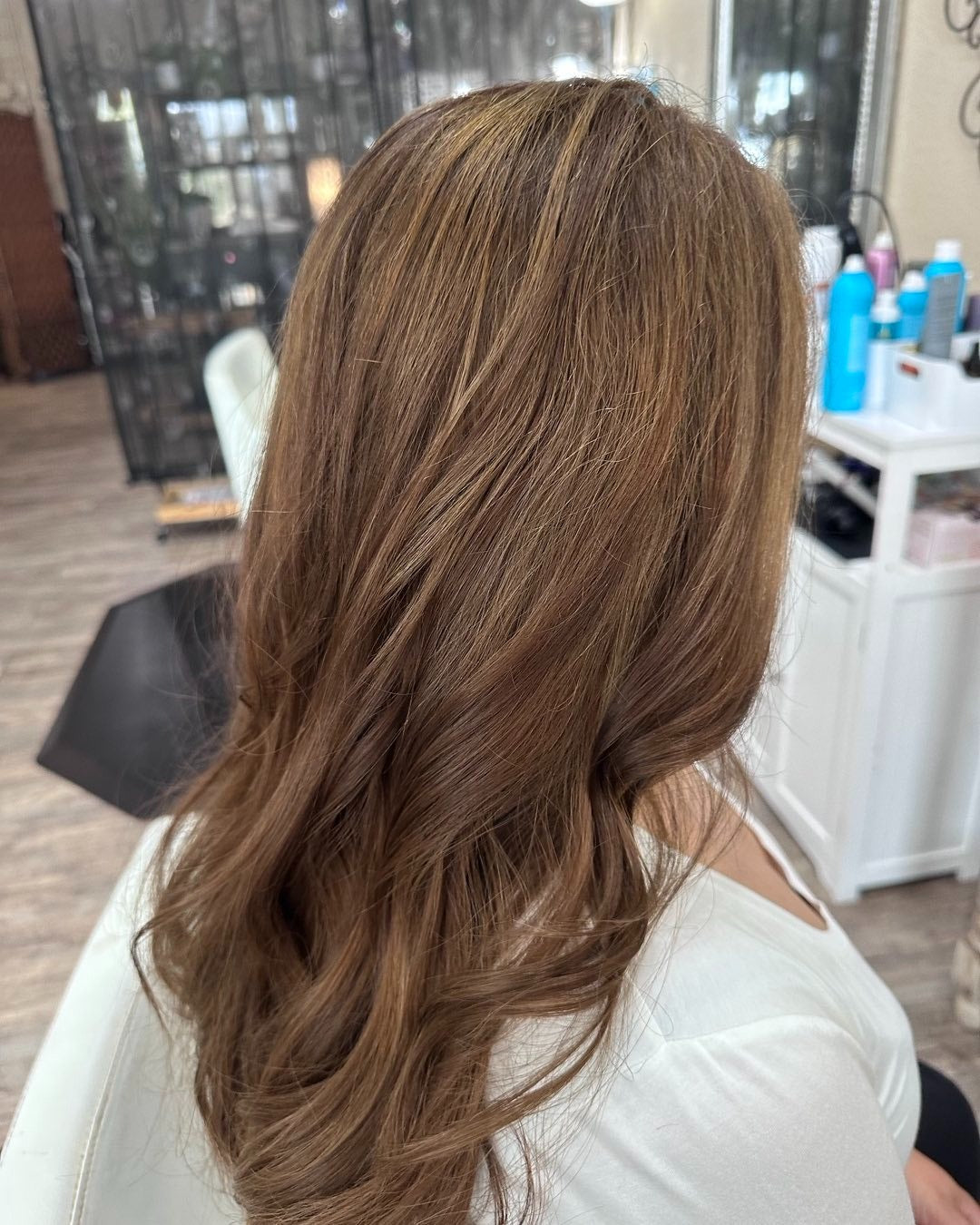 2. Sunlit Chestnut Brown Layers (Light Brown Hair Color)