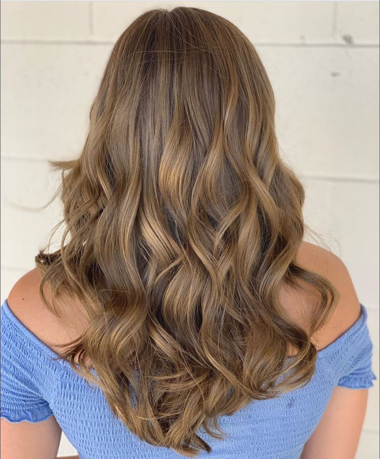 6. Bronzed Soft Curls with Dimension (Light Brown Hair Color)