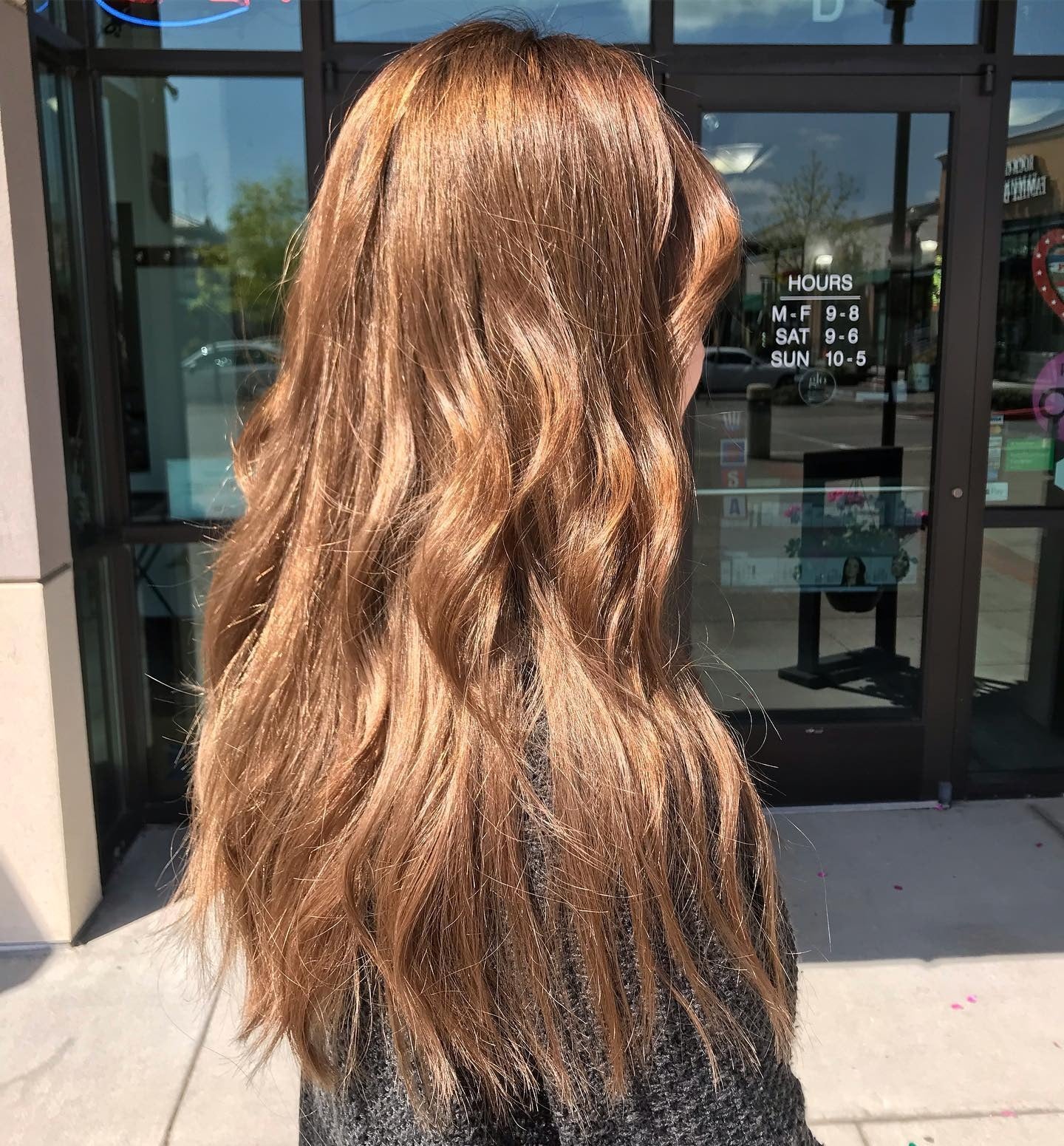 12. Sun-Kissed Copper Brown Waves (Light Brown Hair Color)