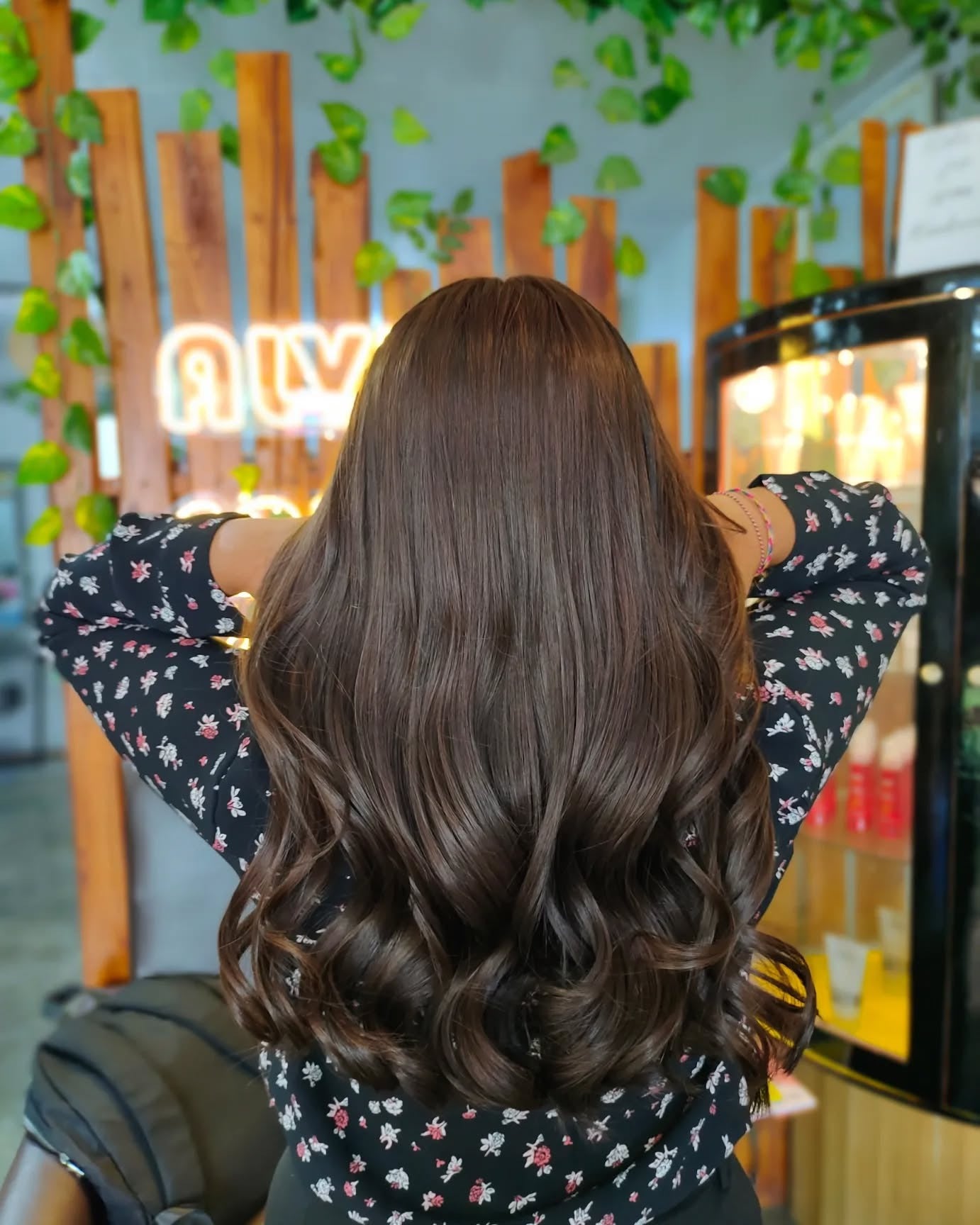 1. Classic Layers with Soft Barrel Waves (Medium Brown Hair Color)