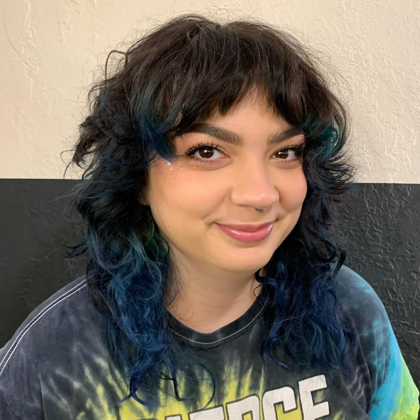 2. Textured Shag with Blue Accents (70S Hairstyles)