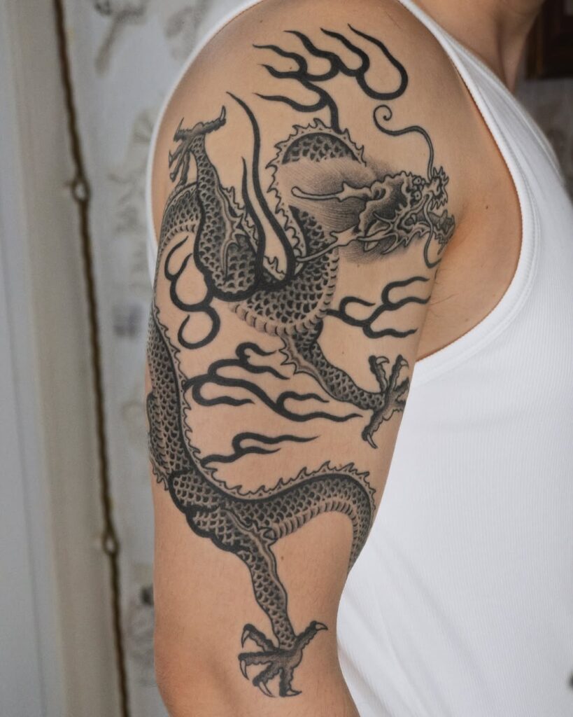 Traditional Black And Grey Dragon Tattoo
