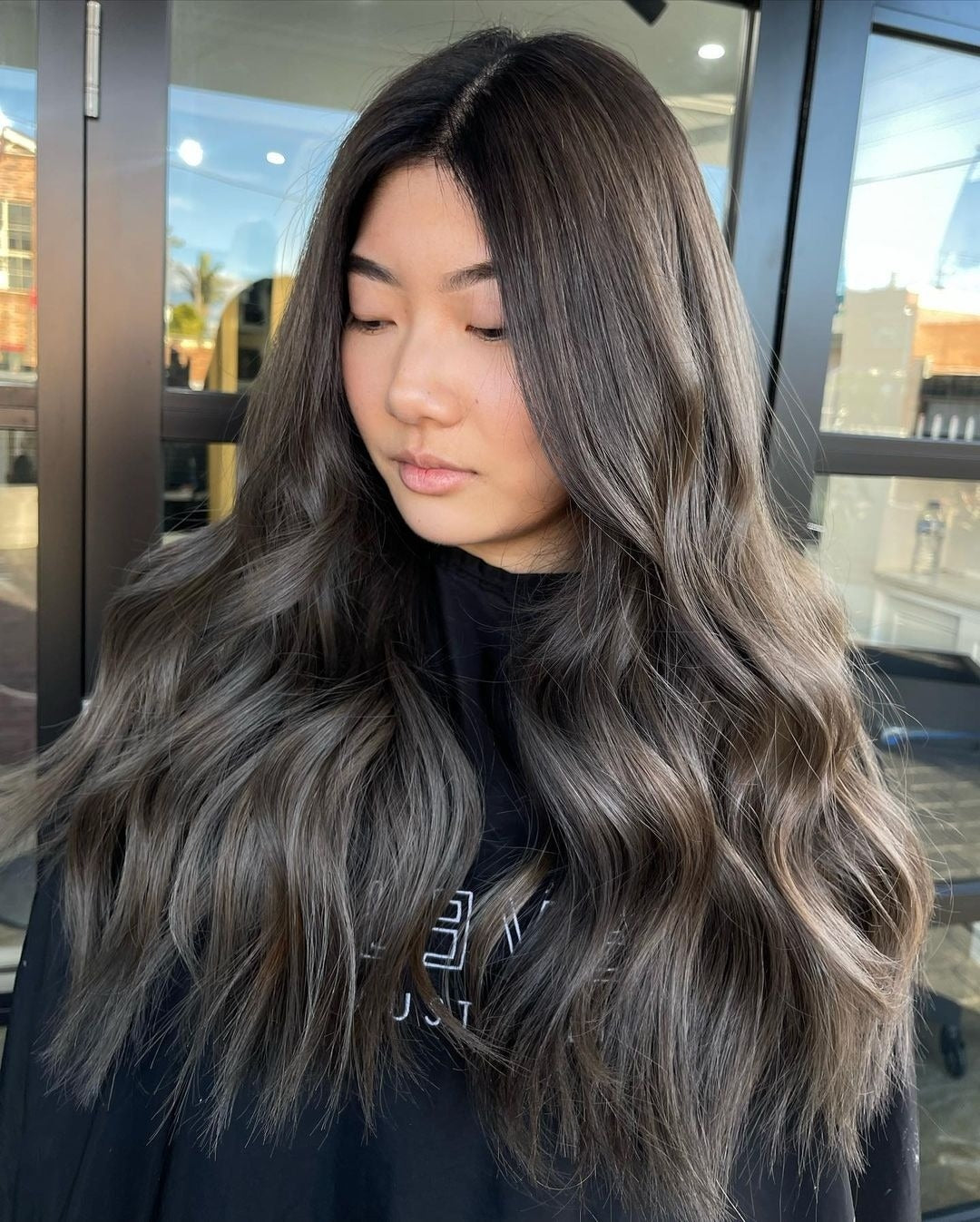 5. Long Textured Waves in Ash Graphite (Dark Ash Brown Hair Color)