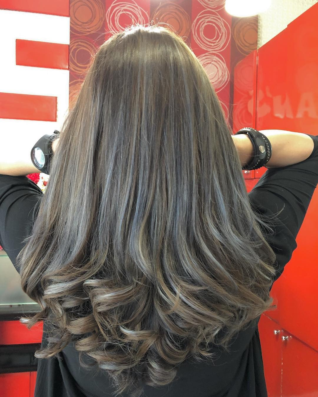 11. Voluminous Curls with Ash Brown Shine (Dark Ash Brown Hair Color)