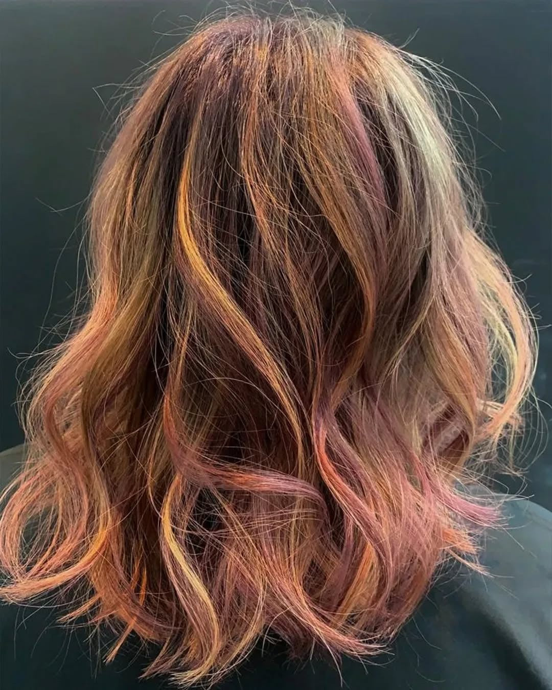 1. Textured Copper-Rose Lob with Soft Layers (Red Brown Hair with Highlights)