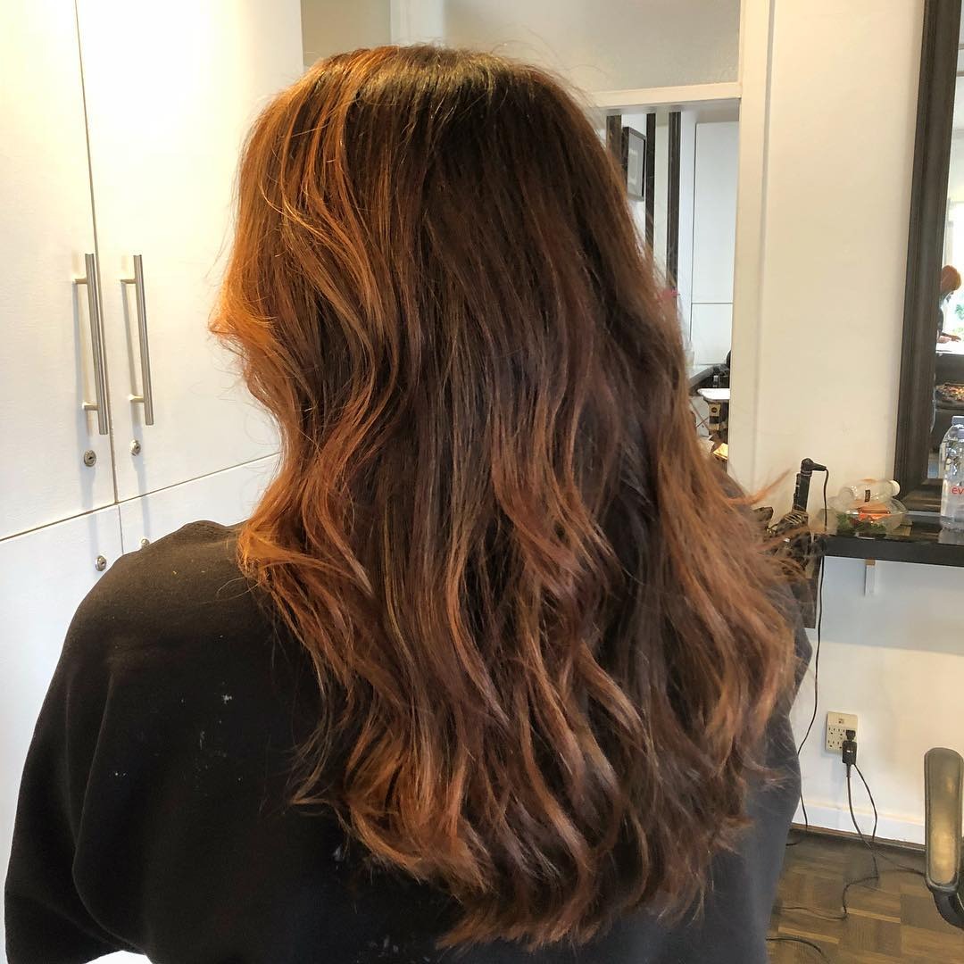 4. Subtle Auburn Blend with Natural Flow (Red Brown Hair with Highlights)