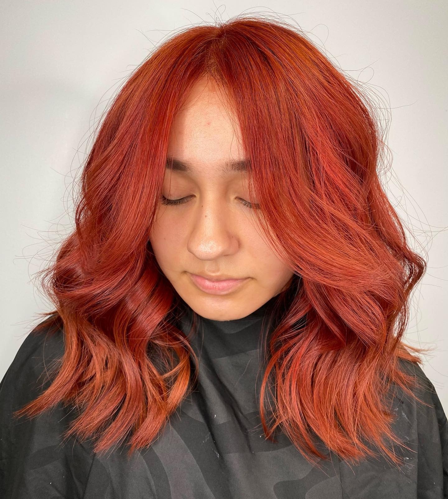1. Soft Copper Waves (Red Orange Hair Color)