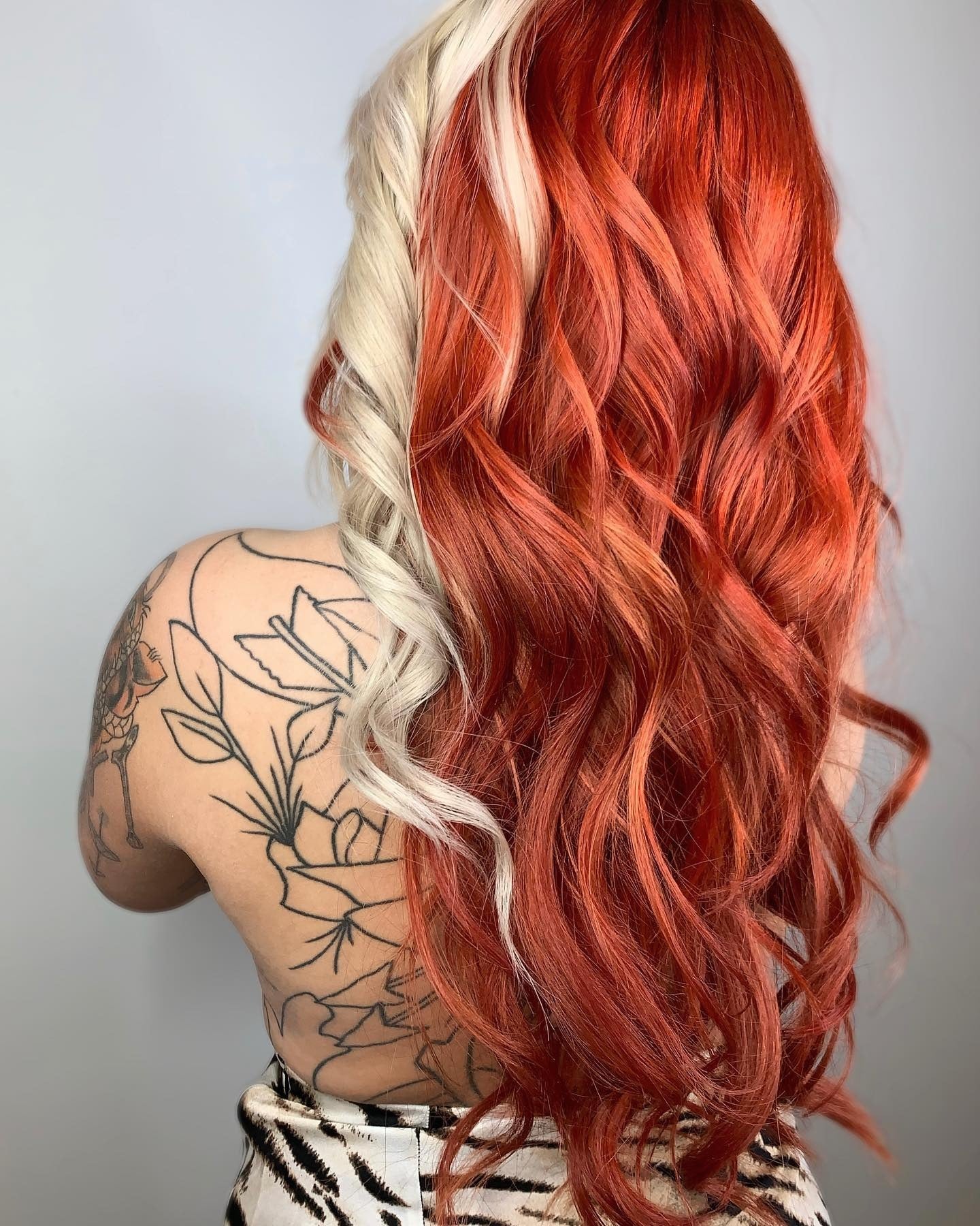 2. Fiery Red with Platinum Accent (Red Orange Hair Color)