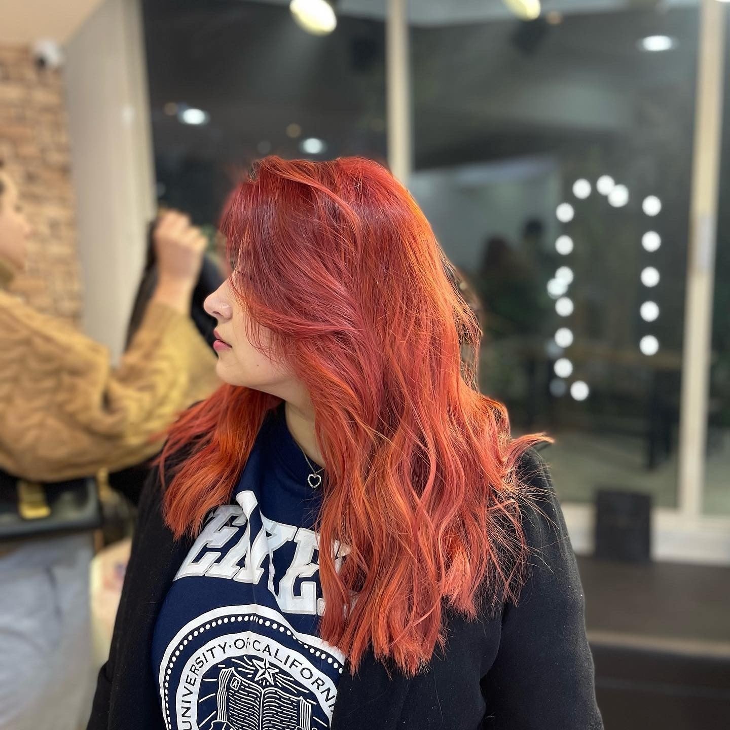 10. Modern Crimson Waves (Red Orange Hair Color)