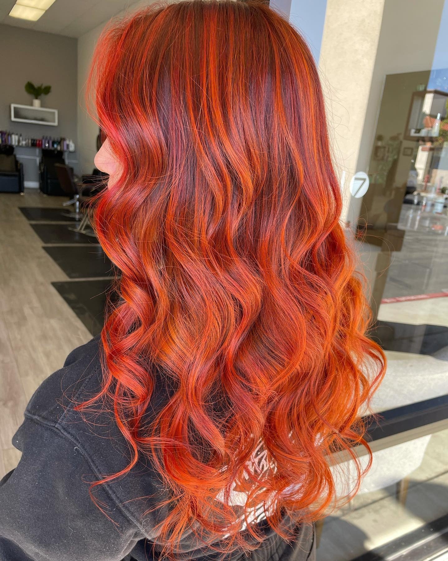 11. Bold Scarlet Waves (Red Orange Hair Color)