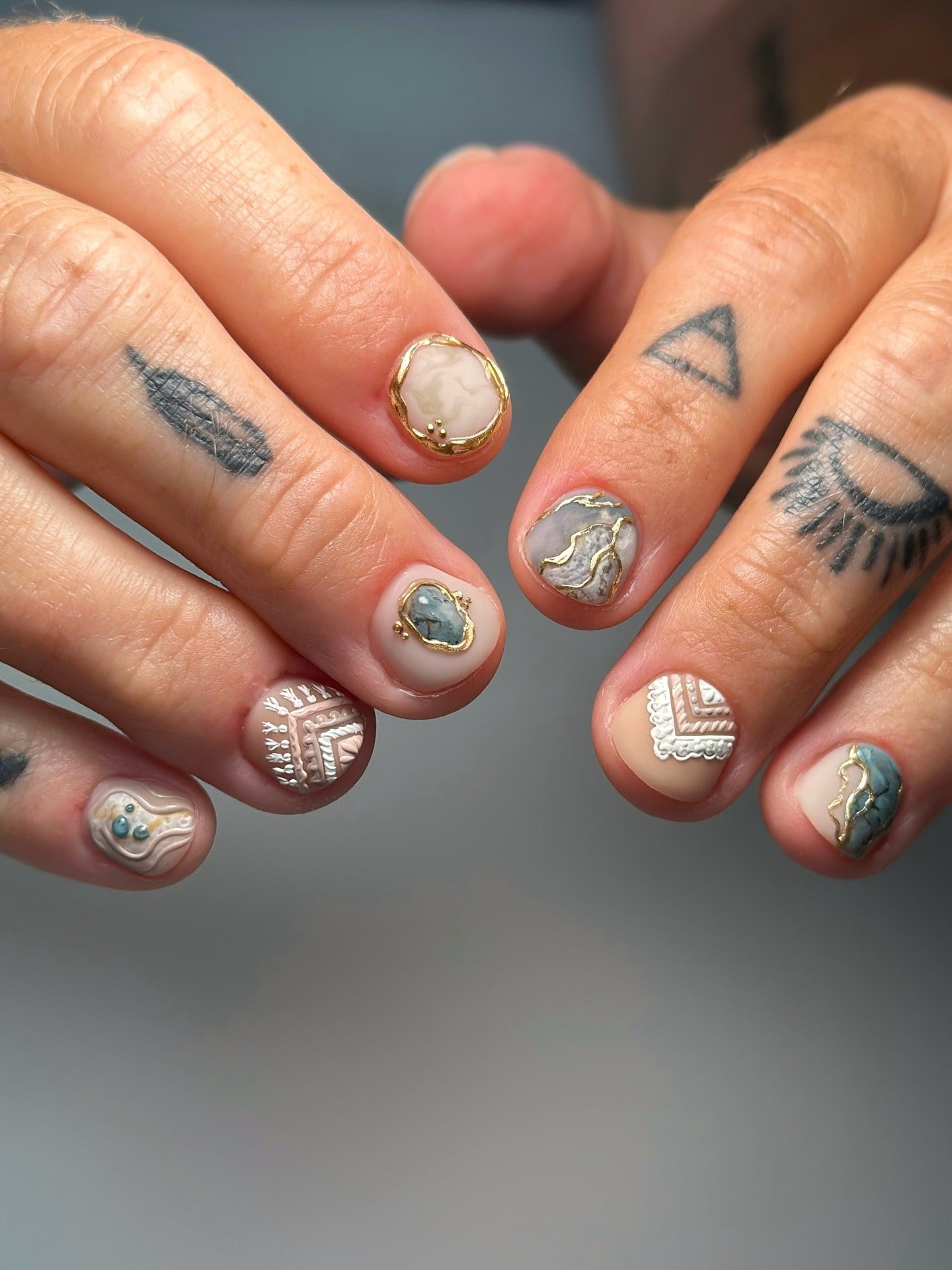 4. Blue Accent with Floral Frames (Short Nail Art Ideas)