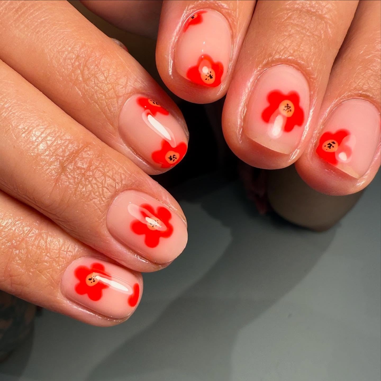 3. Bold Red Blossom Nails (Short Nail Art Ideas)